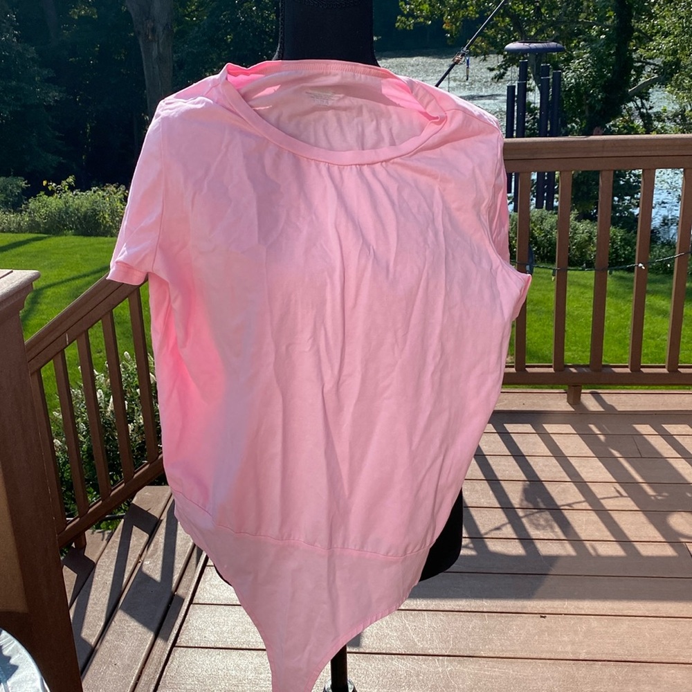 Pink short sleeve bodysuit. Worn once. Size L.